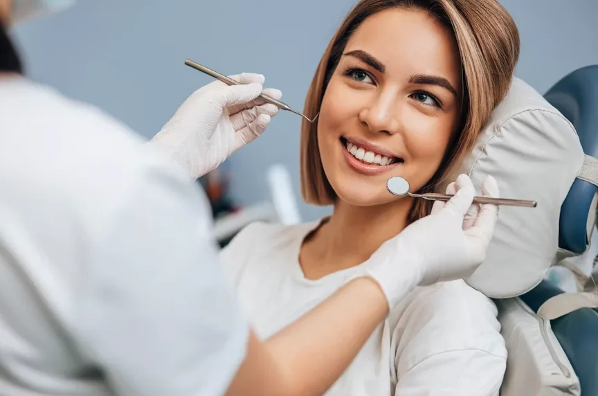 Patient smiling comfortably after a dental visit